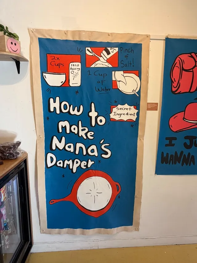 How to Make Nana's Damper by Molly Hunt, a comic-style canvas hung in the gallery